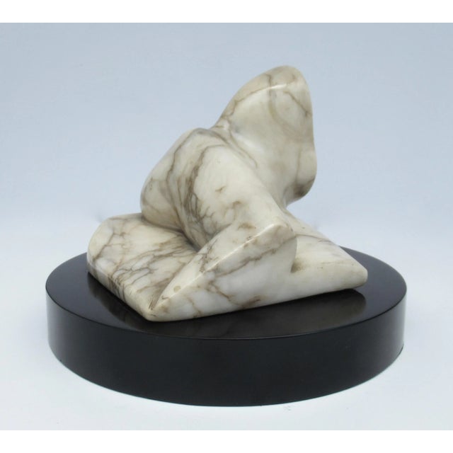 C.1970's Italian Carrara Marble Carved & Honed Reclined Female Figure Sculpture, Mounted on Round Black Marble Base For Sale - Image 4 of 13