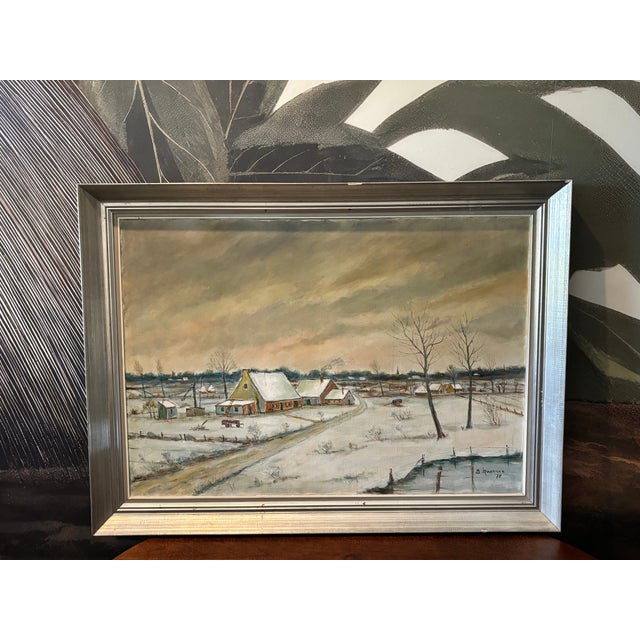 Signed Belgian winter village landscape, dated 1975, depicting a snow covered rural scene. Charming and quiet, presented...