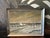 Signed Belgian winter village landscape, dated 1975, depicting a snow covered rural scene. Charming and quiet, presented...