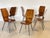 Set of 6 1960s chairs made of curved plywood, black lacquered iron structure, two sets available 6