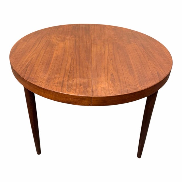 1960’s Danish Modern Teak Dining Table attrb Kai Kristiansen. Round table extends with two included leaves (not self...
