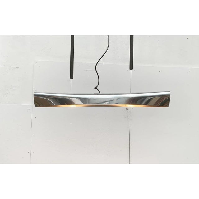 Elegant pendant lamp from the german manufacturer anta designed by jörg zeidler. the elongated lamp body of the nile is...