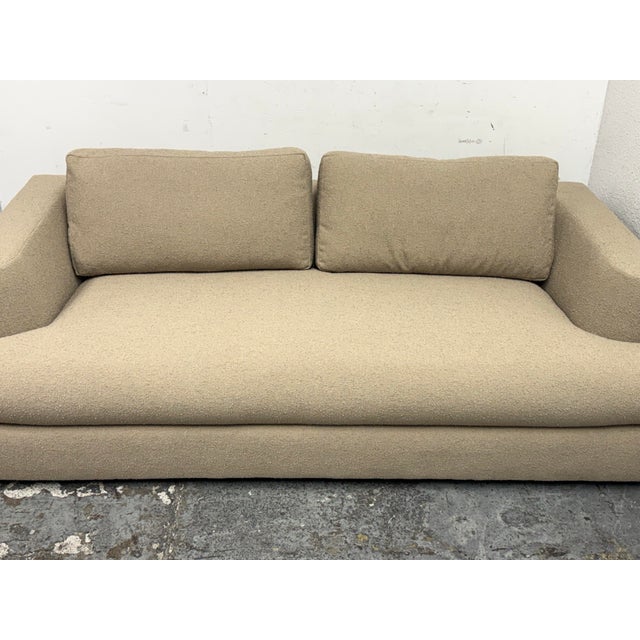 Design Plus Gallery presents a Custom Made Sofa with Contemporary Styling. This sofa is upholstered in a textured fabric...