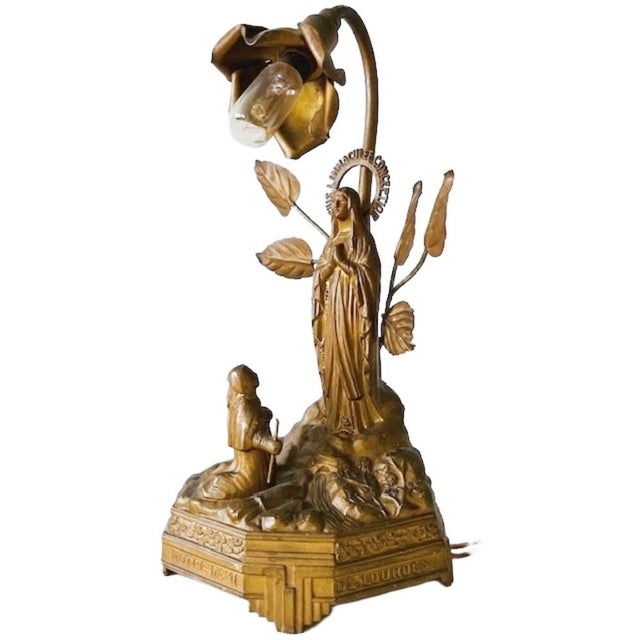 Rare antique brass Lourdes Maria souvenir lamp/music box from circa 1910. The subject of this religious statue is the...