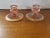 This is a Pair of Vintage Pink Depression Glass Tapered Candle Holders Gilded Floral Scroll Design. They each measure 3"...