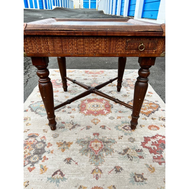 This game/card table by Stiles Brothers for Bauer International is designed in rattan, leather and mahogany with brass...