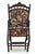 A distinctive late 19th-century Victorian folding parlor chair featuring an unusually decorative carved wood frame and...