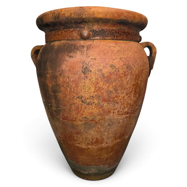 An extraordinary and exceptionally rare matching pair of monumental 19th-century (or older) Mediterranean terracotta...
