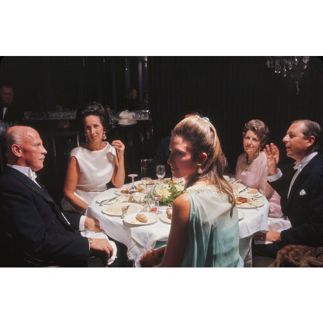 Dinner's Served! by Toni Frissell Friends conversate over dinner at the opening of the New Metropolitan Opera House, 1966....