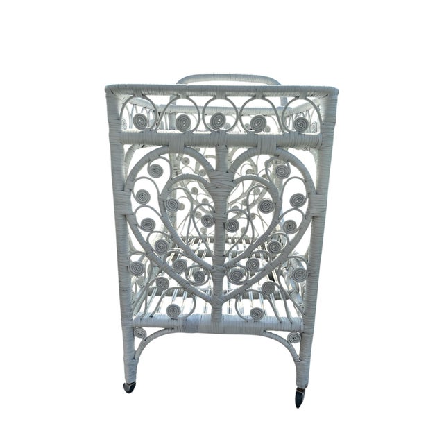 Beautiful wicker bar cart. Bought from a very chic designer in Connecticut. This beauty will be the talk of your cocktail...