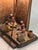 An exquisite early 20th-century Vienna bronze lamp depicting an Arab school teacher and four young students wearing...