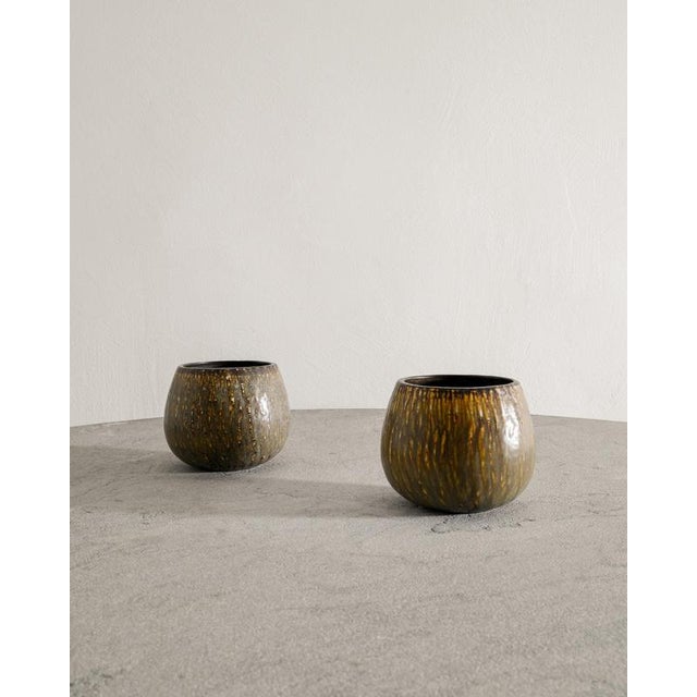 Rare pair of Swedish mid century decorative ceramic high bowls in brown golden glaze from the series "Rubus" designed by...