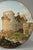 A large circular micromosaic panel representing the so called "Tomb of Cecilia Metella on the Appian way" near Rome. This...