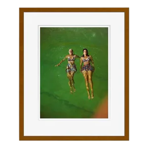 Floating 1961 by Toni Frissell Framed C Print