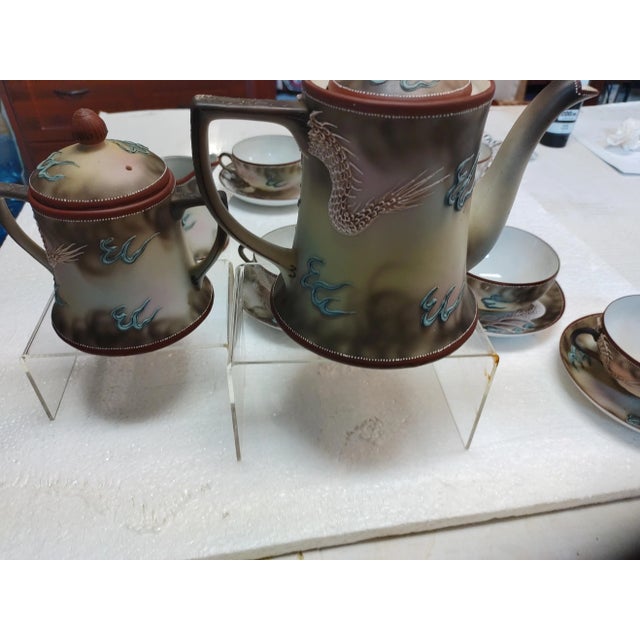 Nippon Dragonware Tea Set. Service for 6. Includes teapot, sugar, creamer, 6 cup and 6 saucers. Antique Mortgage Hand...