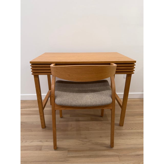 Beautiful small oak wood desk, perfect for a New York City apartment, from Design within Reach. Chair sold separately and...