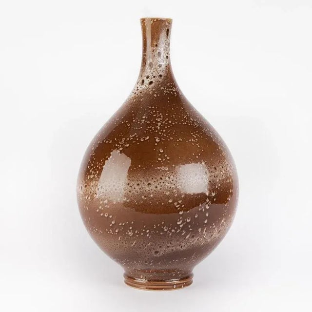 A ceramic vase made by the Czech company Ditmar Urbach that was established by Rudolf Ditmar in Znojmo in 1878 and later...