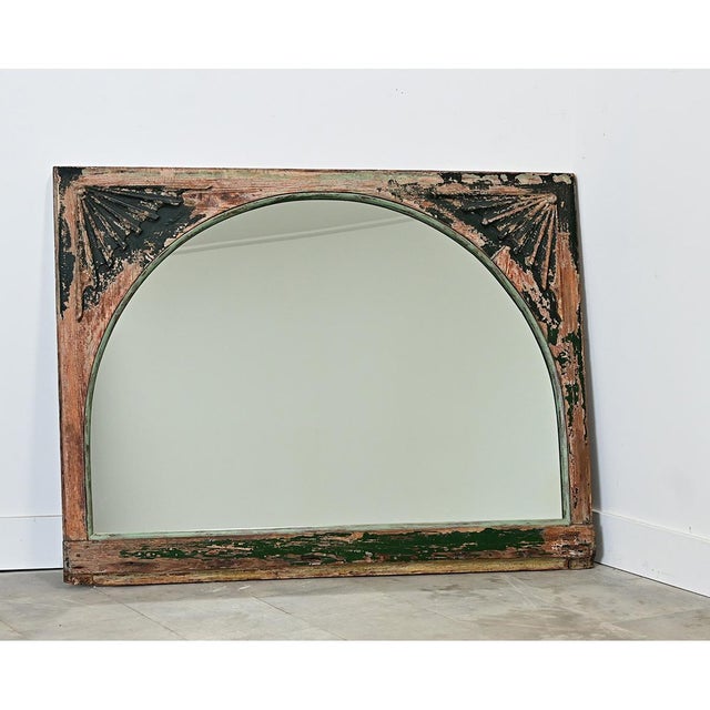 A unique carved and painted wood transom from late 19th century France that would have been built into the architecture of...