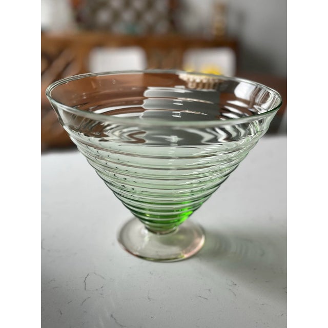 This vintage, watermelon glass, piece is the perfect summertime table-top stunner. Sitting on its peachy pedestal, this...