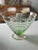This vintage, watermelon glass, piece is the perfect summertime table-top stunner. Sitting on its peachy pedestal, this...