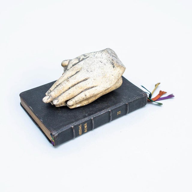 Artwork with old book and mysterious praying hands. Made by unknown artist in Spain, circa 1990. In original condition,...