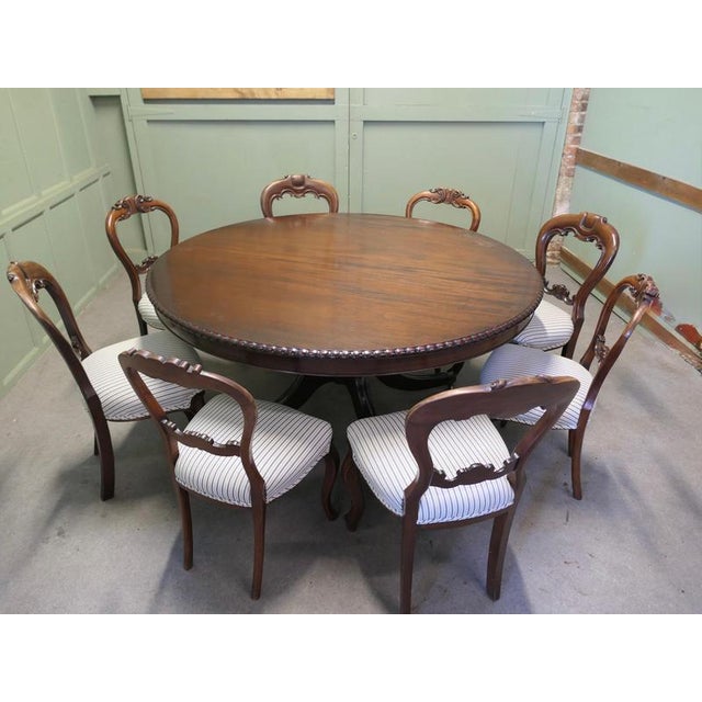 Large Centre Dining Table and 8 Chairs. This is an outstanding set. The table is circular, and it has the ability to be...