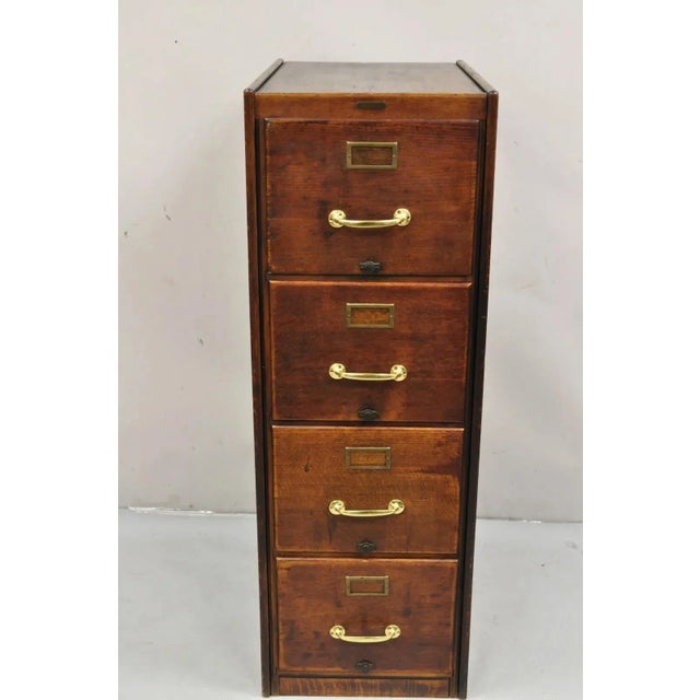 Antique Shaw Walker Quarter Sawn Oak 4 Drawer Arts & Crafts Office File Cabinet. Circa Early 1900s. Measurements: 52" H x...