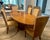 This gorgeous dining table and chairs is a modern 1930's Art Deco style suite, crafted with burl maple and satinwood...