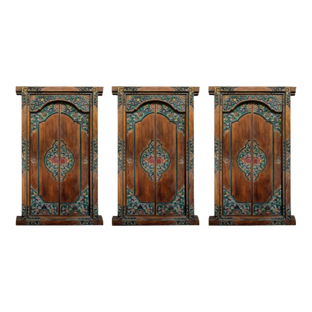 Magnificent Asian teak-like hardwood door set in a substantial frame. Gorgeous decorative work includes carved, intricate...