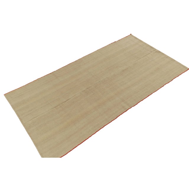 Connoting mid-century aesthetics in handwoven wool, a 5x9 vintage kilim rug from our recently curates flatweaves. This...