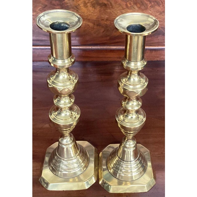 Hard to find extra tall pair of antique 19th century brass beehive candlesticks. Sticks are 12" tall and the bases are 4...