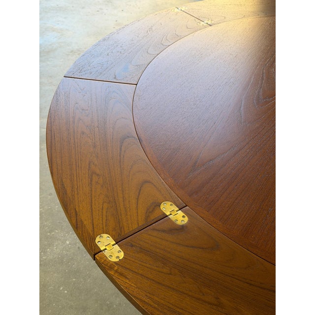 Dyrlund Dyrlund Lotus Round Teak Dining Table With Flip-Out Extension Leaves – Vintage Danish Mid-Century Modern For Sale - Image 4 of 12