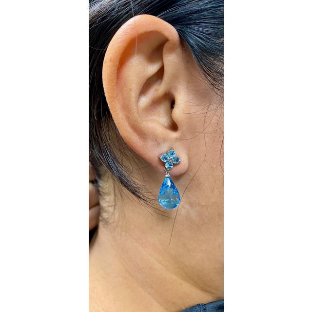 23.31 Carat Blue Topaz White Gold Drop Earrings Item Specifics 2 Faceted Briolette Blue Topaz stones weighing...