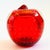 A vintage art glass apple paperweight. Vibrant red color to the glass. Beautiful controlled bubbles to the center of the...