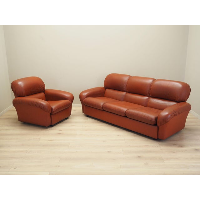 The living room set was made in the 1960s, Italian production. Both the sofa and armchair have been kept in their original...