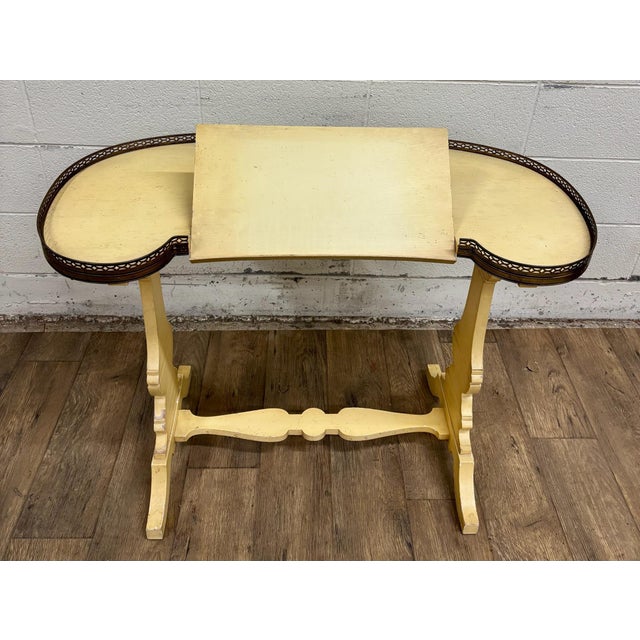 This is a stunning vintage, possibly antique, French Louis XV style kidney shaped and brass galleried writing desk, center...