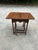 Up for consideration is a beautiful vintage pair of wooden carved nesting game tables. These would look lovely in your...