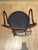 Set of 8 bentwood dining chairs with new pebbled off black vinyl upholstery. Some aging marks on arms and a repair on one...