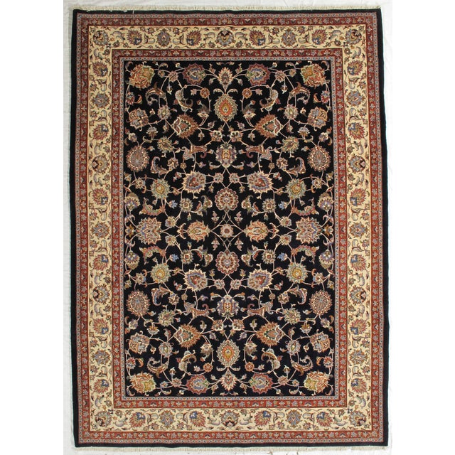 Vintage Hand-knotted Persian Mashad rug from northeastern Iran, known for its durable construction and fine workshop...