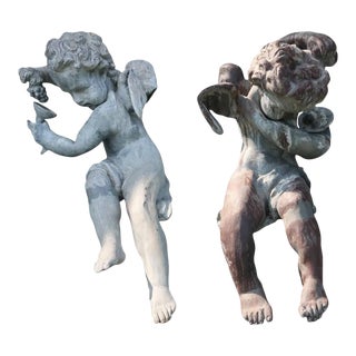 Late 19th Century French Lead Bacchus Cherub Seated Garden Figures - a Pair For Sale