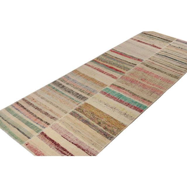 Handwoven in wool, Rug & Kilim presents a 3x8 contemporary runner from their innovative new patchwork kilim collection. On...