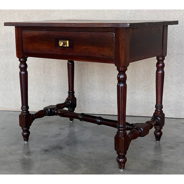 Spanish Country side table with drawer. Made of antique pine called "mobila", this table is very functional and you can...