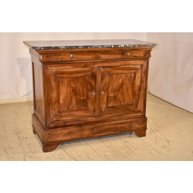19th century period Louis Philippe buffet with a marble top. This piece is absolutely stunning all around. The top is cut...
