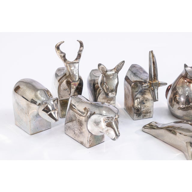 A set of 9 vintage 1970s Gunnar Cyren for Dansk zoo series silver plated animal paperweights. This is a very fun set of...