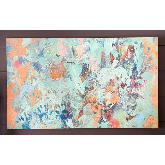 Here is a wonderful, statement painting on canvas, stretched over a sturdy wood frame. The piece features colors in peach,...