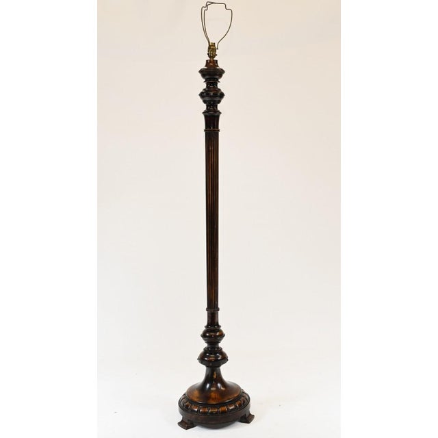 Hand carved English floor lamp in mahogany. Fine details and carving classically fluted. Bought from a dealer at Newark...