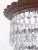 Italian layered chandelier with silver plated rim and 30% leaded U-drop crystal drops. It has 1 edison base socket that...