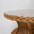 tylish 1970s coastal braided rattan coffee table featuring a distinctive hourglass form and a fitted glass top. The...