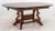Spanish Renaissance Revival Extending Oak Oval Dining Table, raised on carved pedestal base, with two leaves. Without...