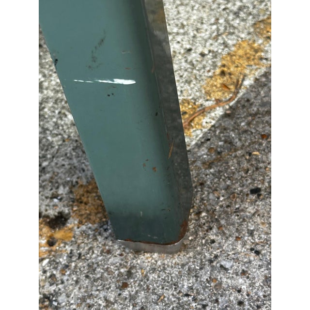 Vintage industrial desk in green-grey painted metal, likely dating from the 1950s. Compact and functional design with four...